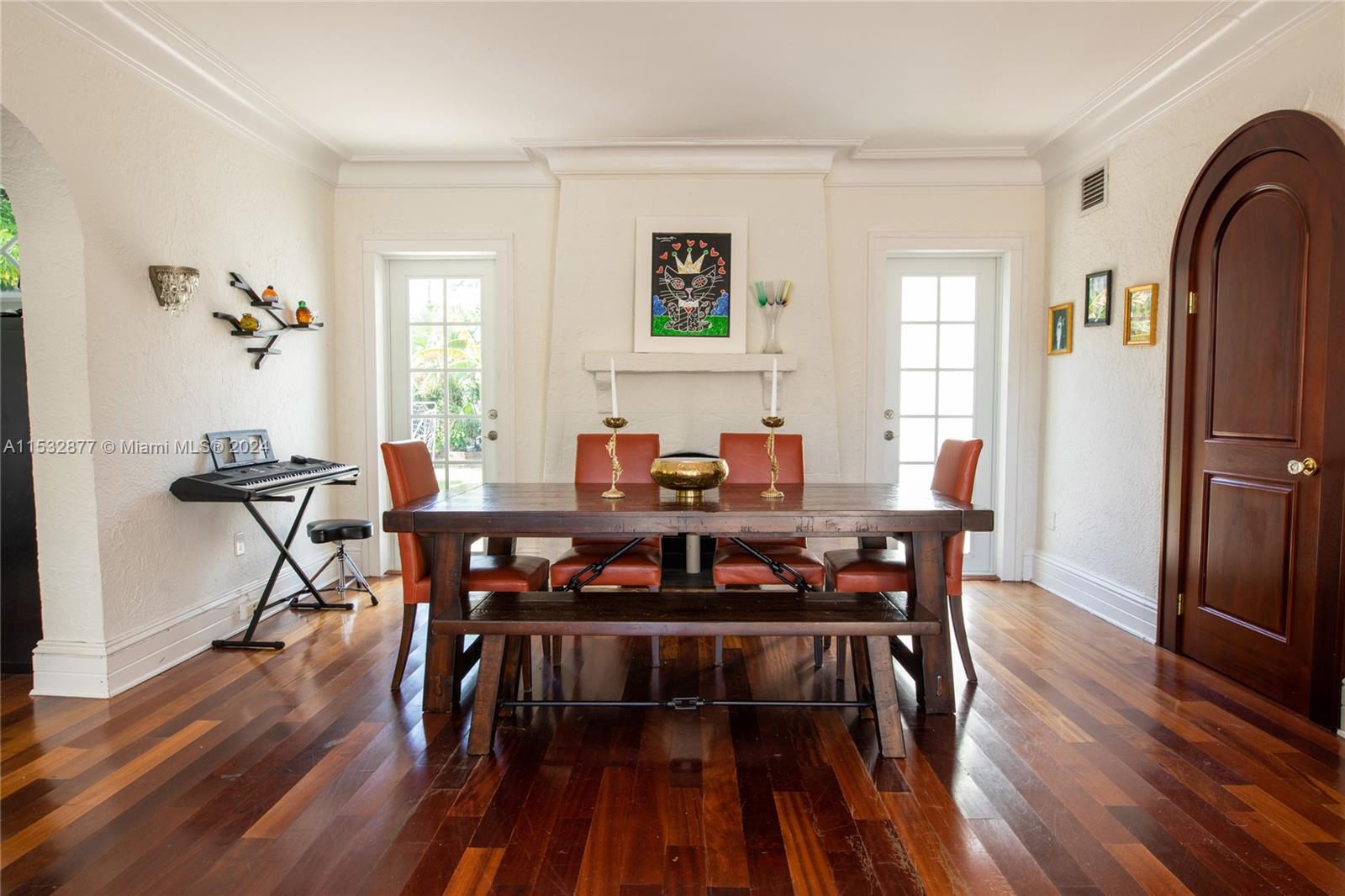 2112 Alton Road Miami Beach, FL 33140 - Photo 13 of 15 a view of a a dining room with furniture window and wooden floor