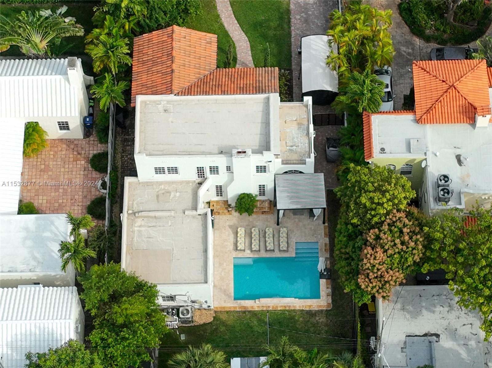 2112 Alton Road Miami Beach, FL 33140 - Photo 3 of 15 an aerial view of residential houses with outdoor space