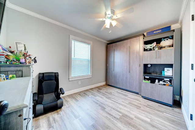 a workspace with furniture and window