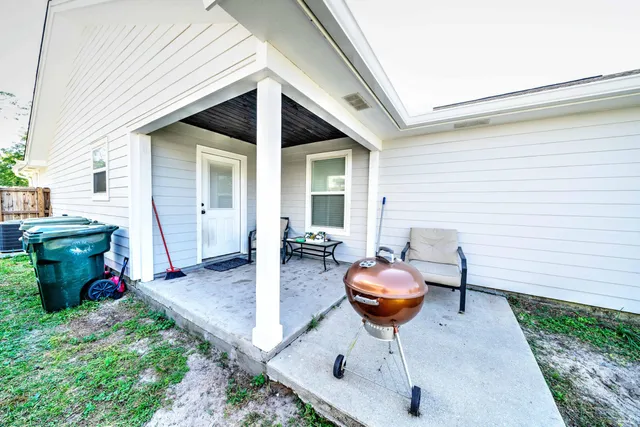 a front view of a house with patio