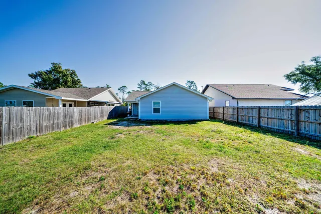a house view with a garden space