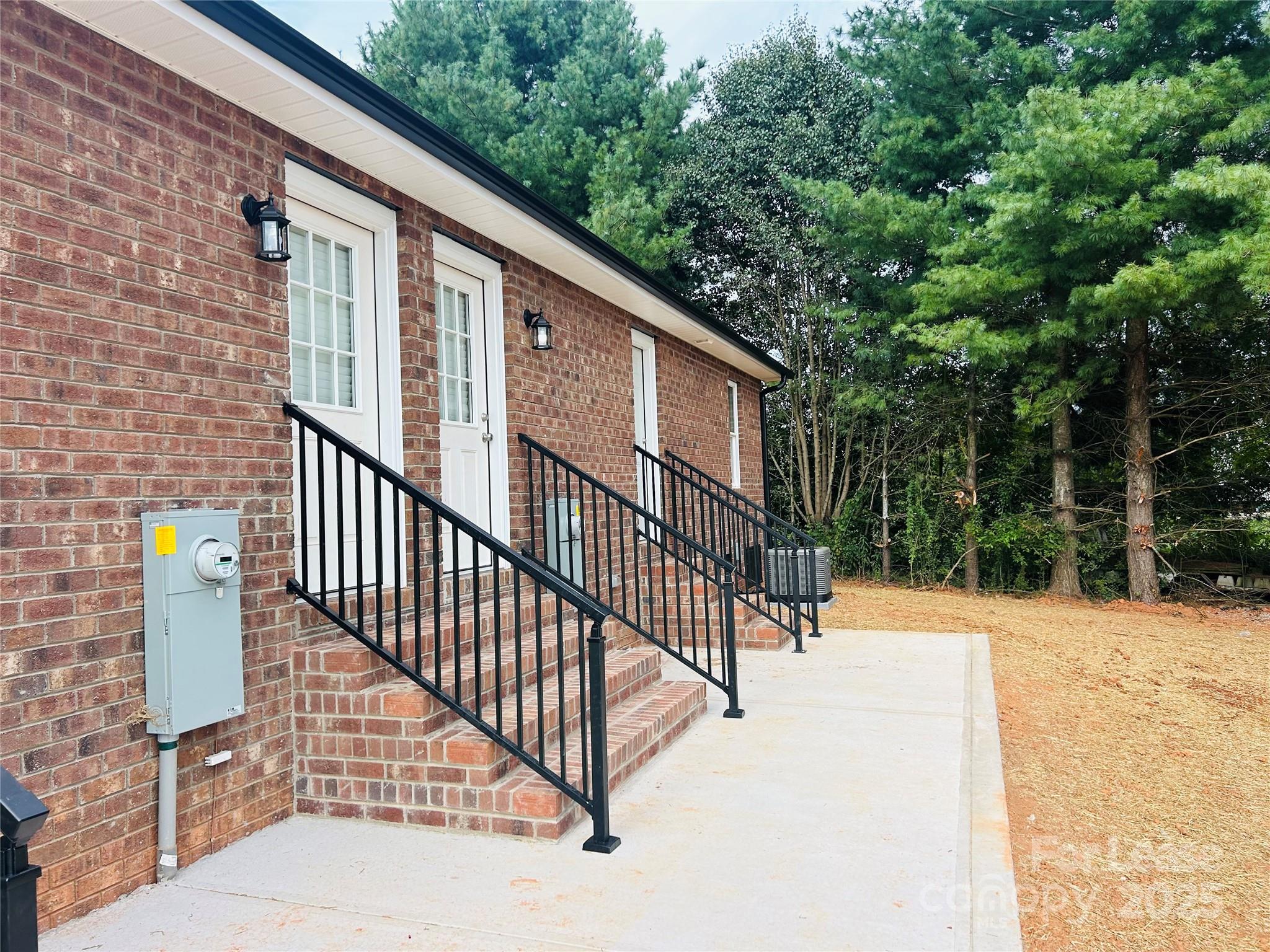 3291 Paul Elmore Road Lincolnton, NC 28092 - Photo 16 of 17 a view of a house with backyard and sitting area