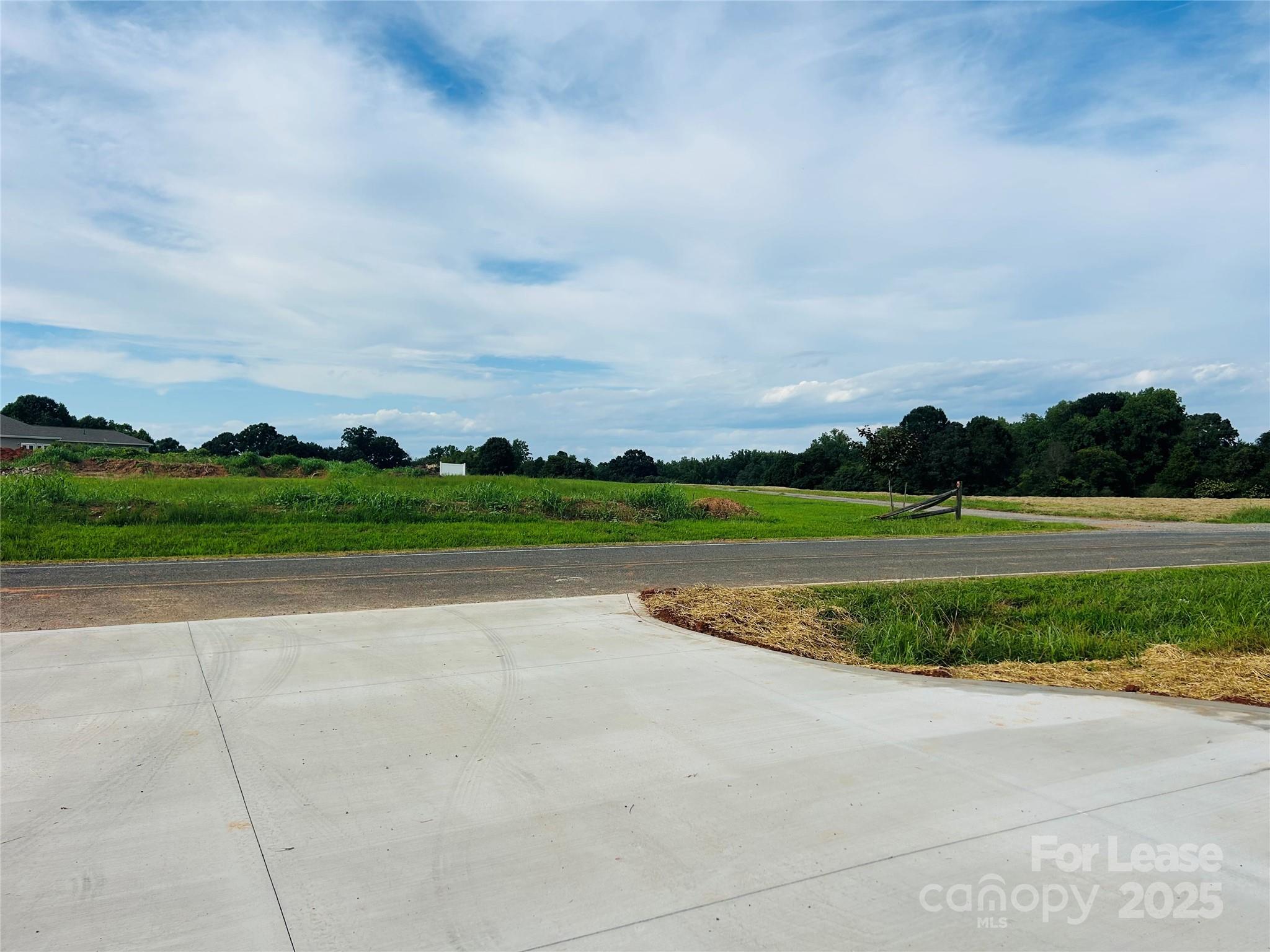 3291 Paul Elmore Road Lincolnton, NC 28092 - Photo 2 of 17 a view of a golf course with a yard
