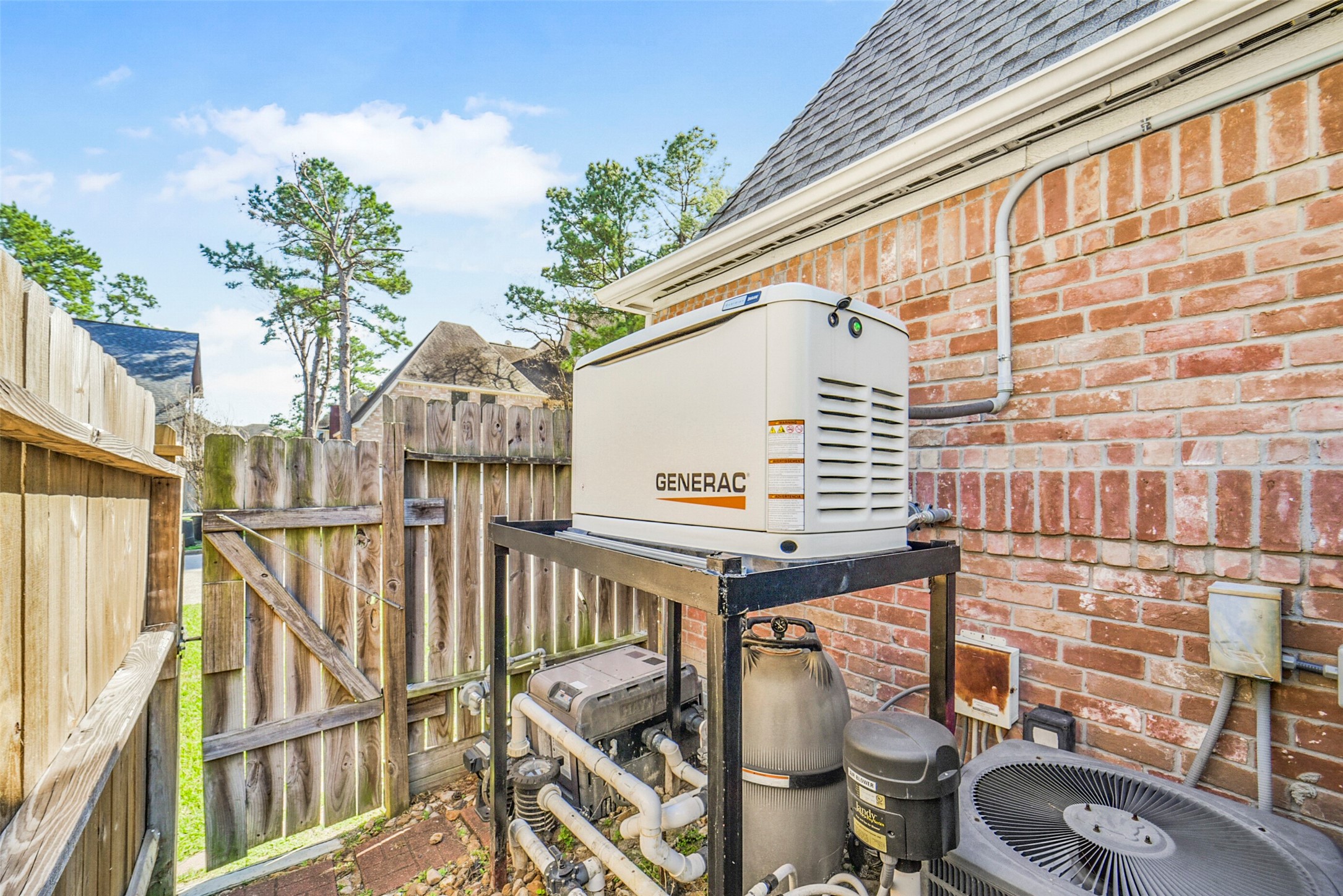 17302 Atherington Place Spring, TX 77379 - Photo 47 of 50 Major upgrades include new roof (2024), 26kW Generac generator, replaced sewer line, and smart home features for modern living.