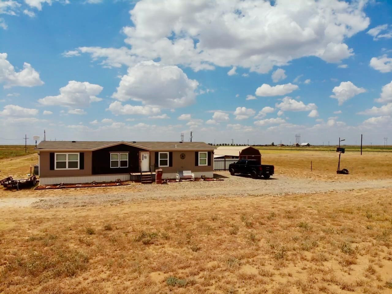760 Highway 82 Ralls, TX 79357 - Photo 1 of 25 a view of a house with a yard