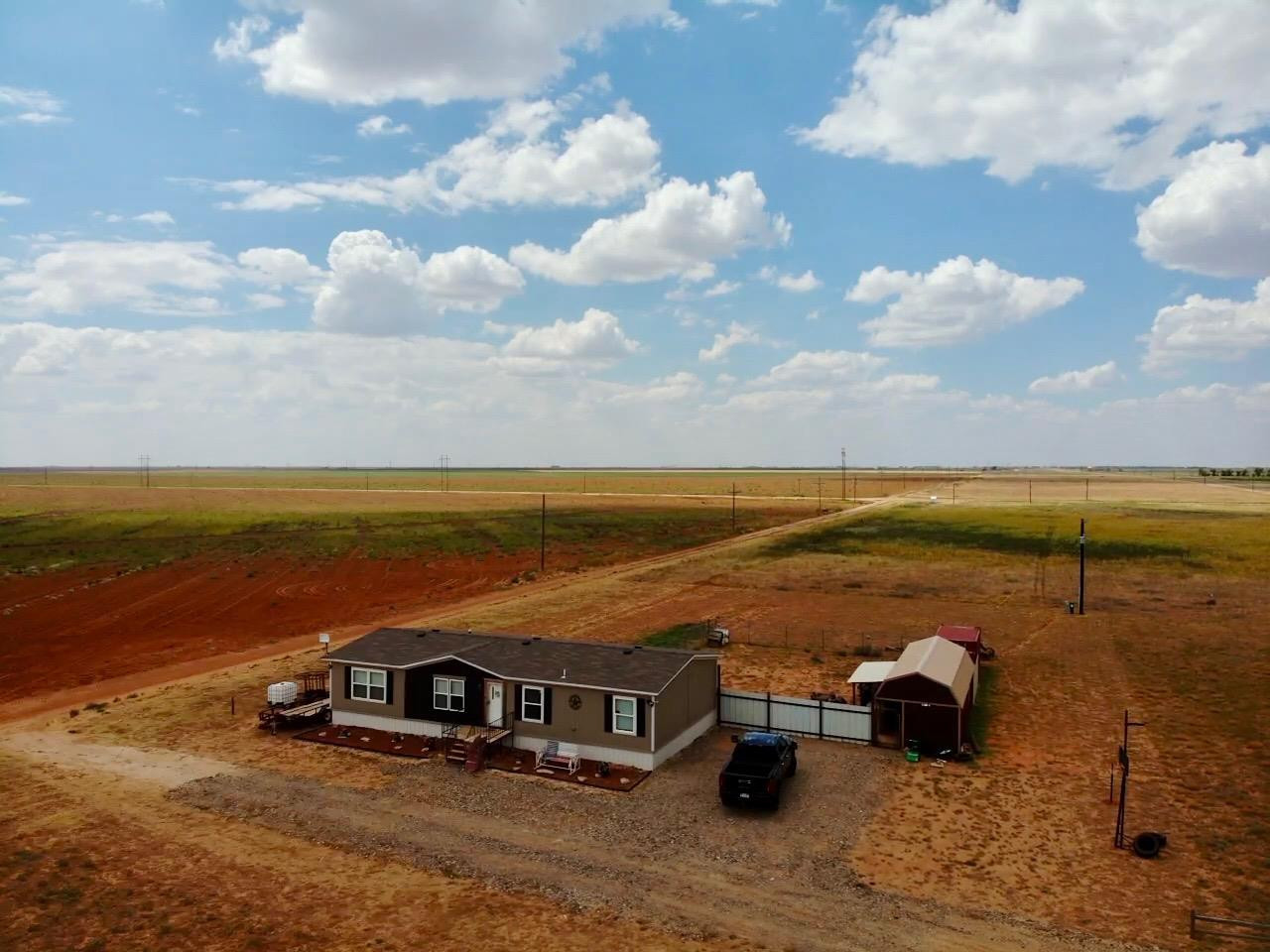 760 Highway 82 Ralls, TX 79357 - Photo 17 of 25 a view of a terrace with lawn chairs