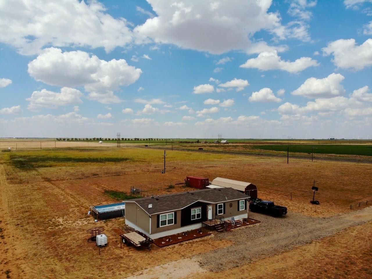 760 Highway 82 Ralls, TX 79357 - Photo 18 of 25 a view of a lake with a terrace