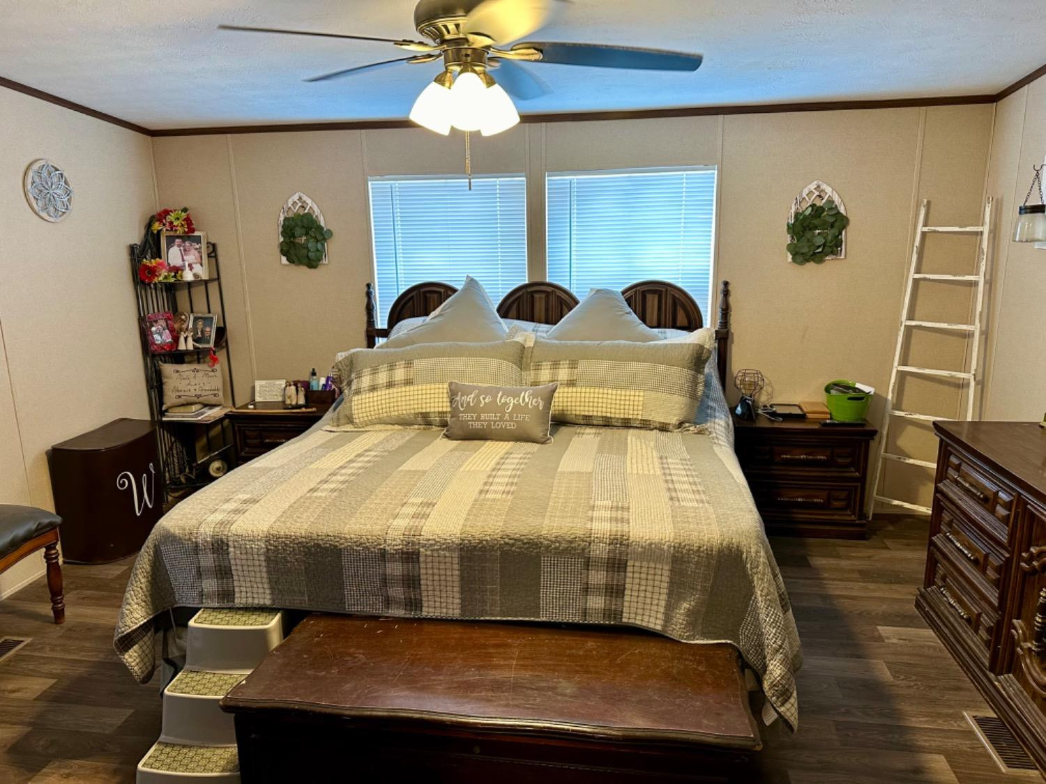 760 Highway 82 Ralls, TX 79357 - Photo 21 of 25 a bedroom with a bed and wooden floor
