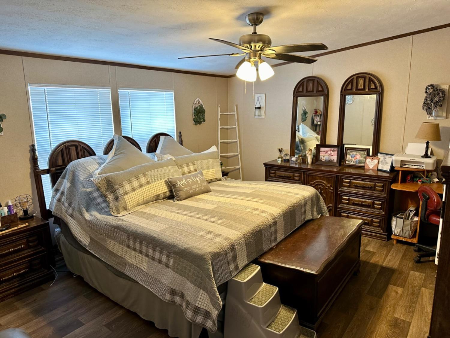 760 Highway 82 Ralls, TX 79357 - Photo 22 of 25 a large bed sitting in a room next to a window