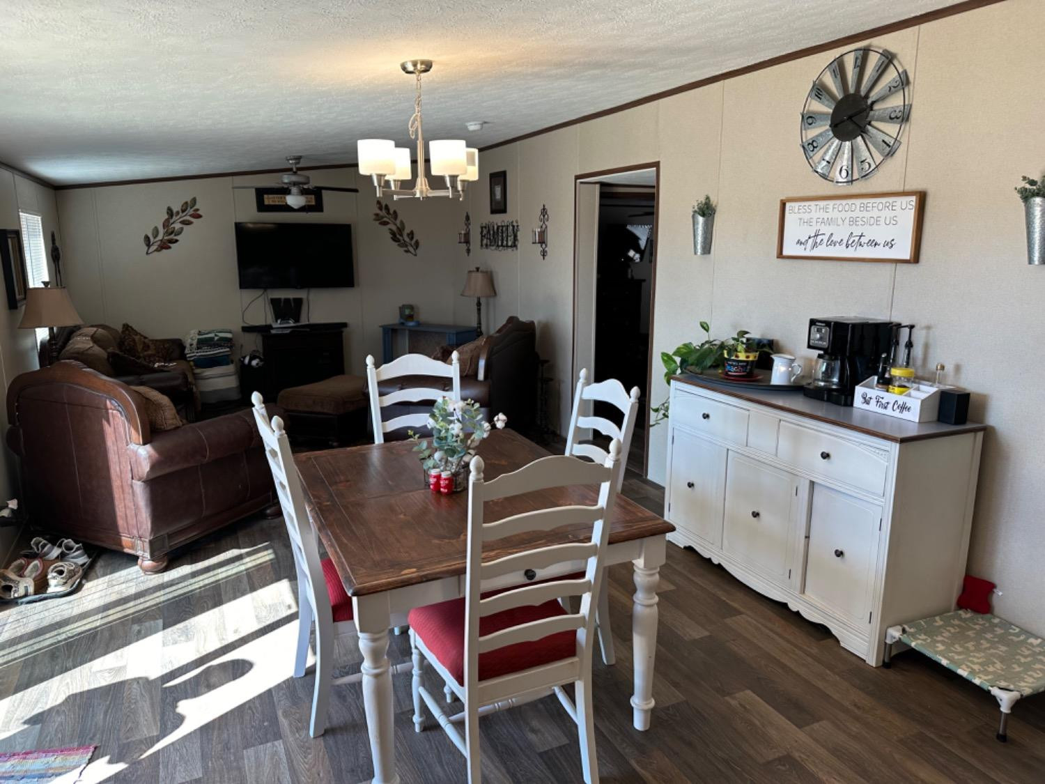 760 Highway 82 Ralls, TX 79357 - Photo 8 of 25 a view of a dining room with furniture and wooden floor