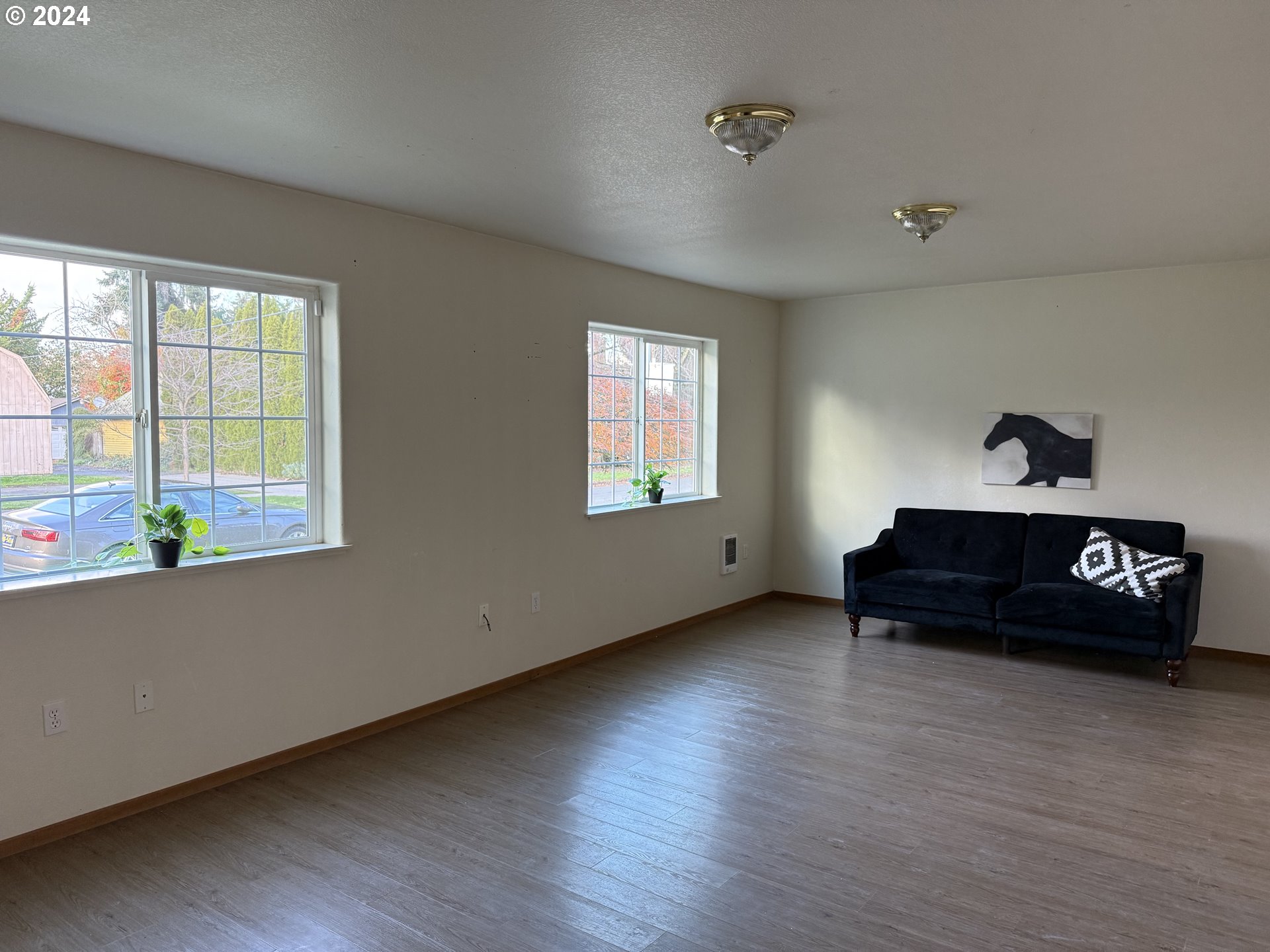 9845 North Lombard Street Portland, OR 97203 - Photo 13 of 35 a living room with furniture and a window