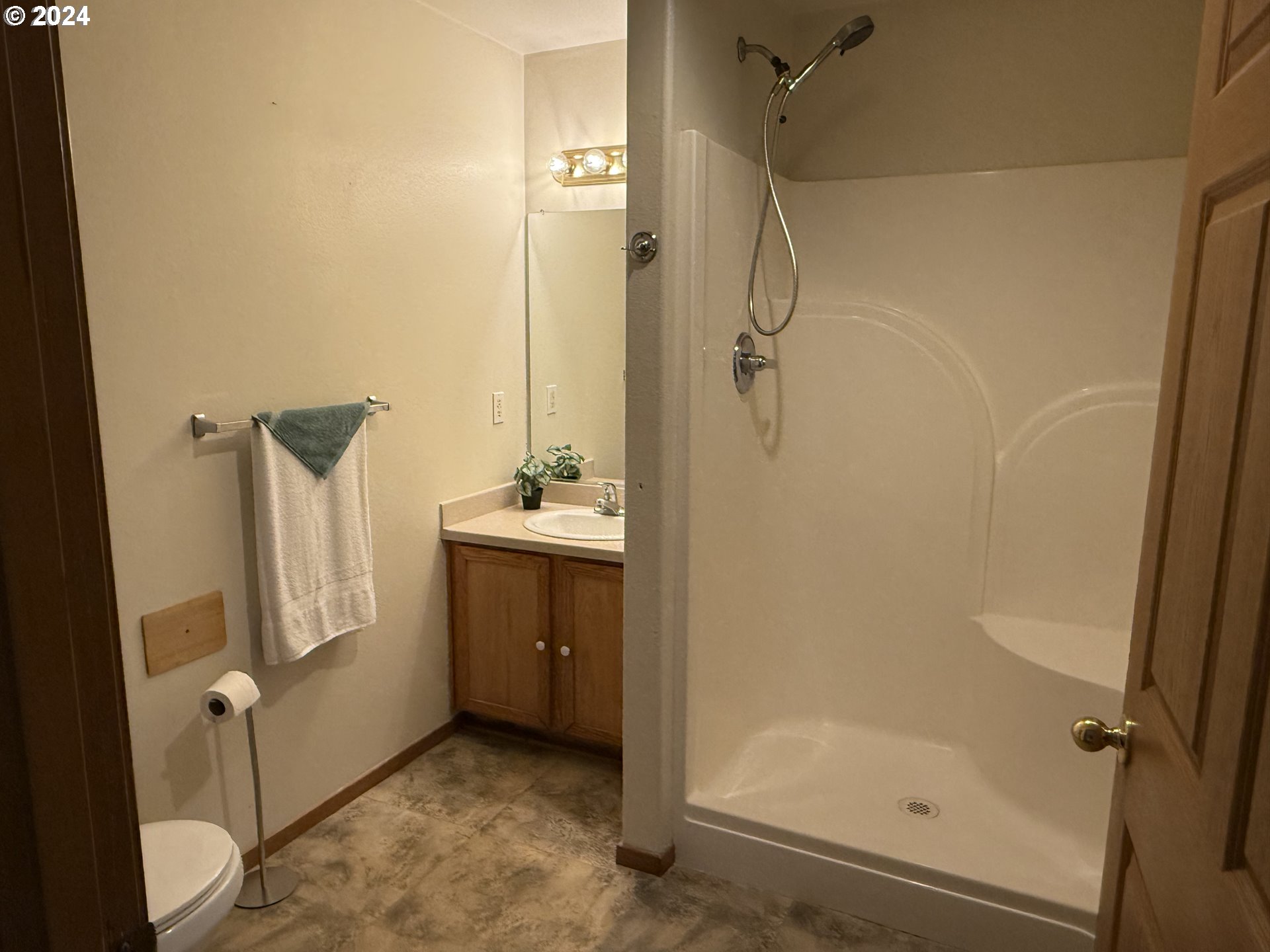 9845 North Lombard Street Portland, OR 97203 - Photo 15 of 35 a bathroom with a shower