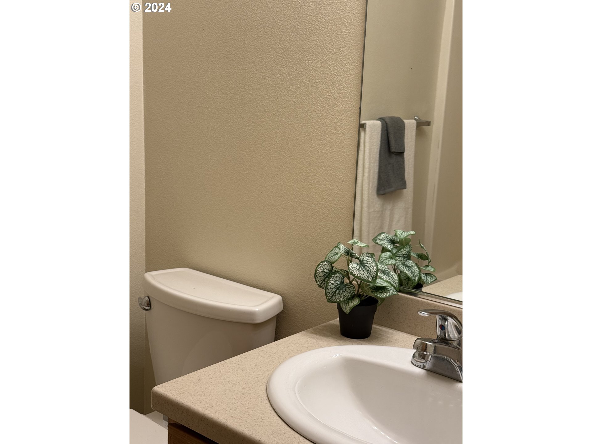9845 North Lombard Street Portland, OR 97203 - Photo 27 of 35 a bathroom with a sink toilet and a mirror