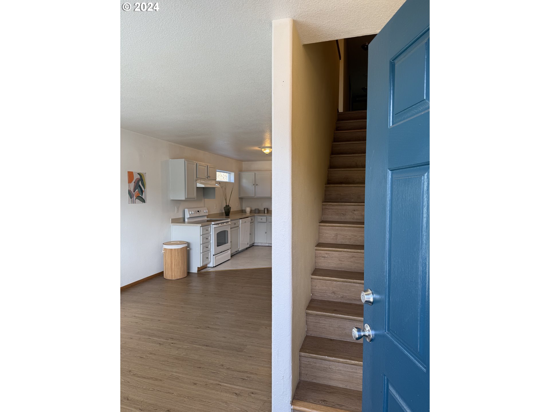 9845 North Lombard Street Portland, OR 97203 - Photo 10 of 35 a view of a living room with a sink and cabinets