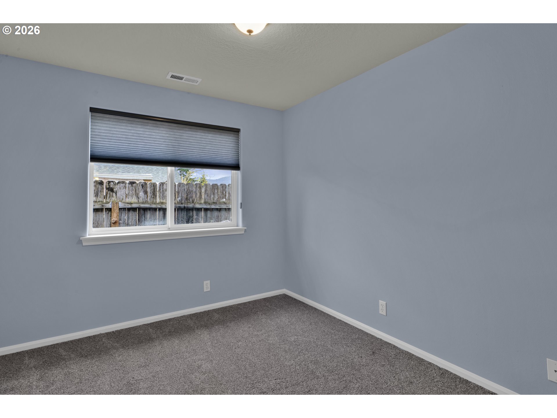 340 54th Street Springfield, OR 97478 - Photo 16 of 33 a view of an empty room with a window