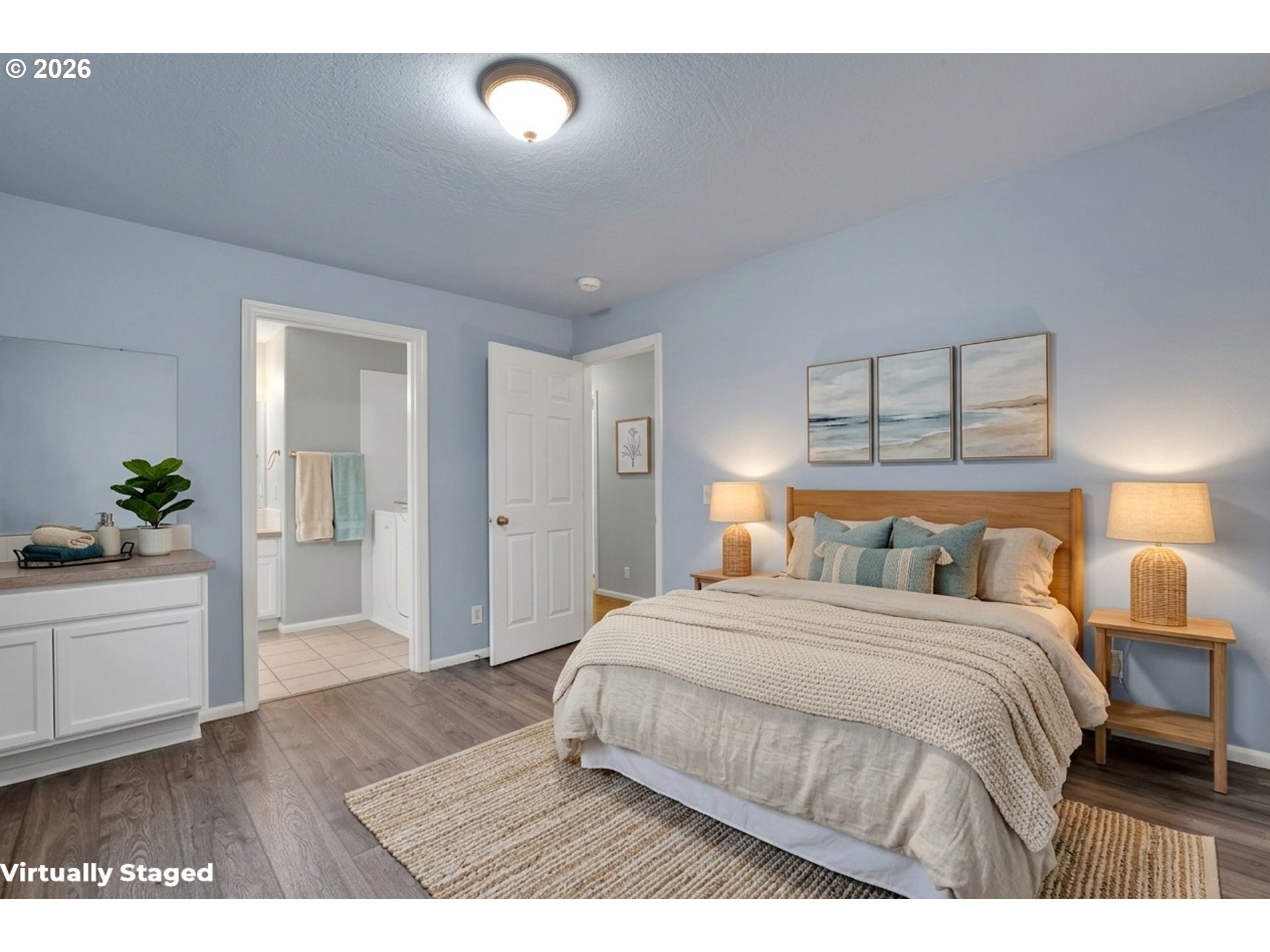 340 54th Street Springfield, OR 97478 - Photo 20 of 33 a bedroom with a bed and a potted plant