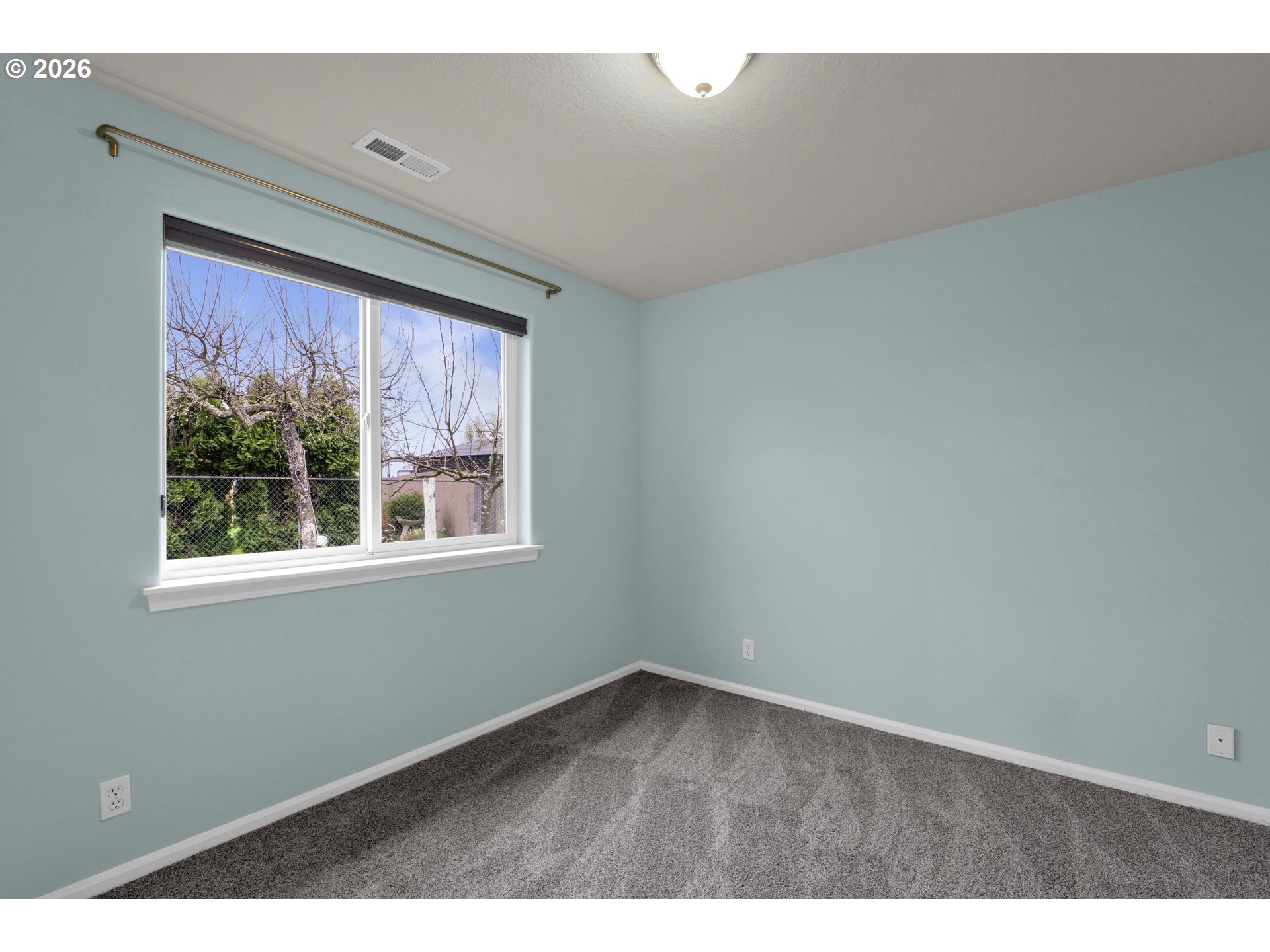 340 54th Street Springfield, OR 97478 - Photo 27 of 33 a view of an empty room with a window