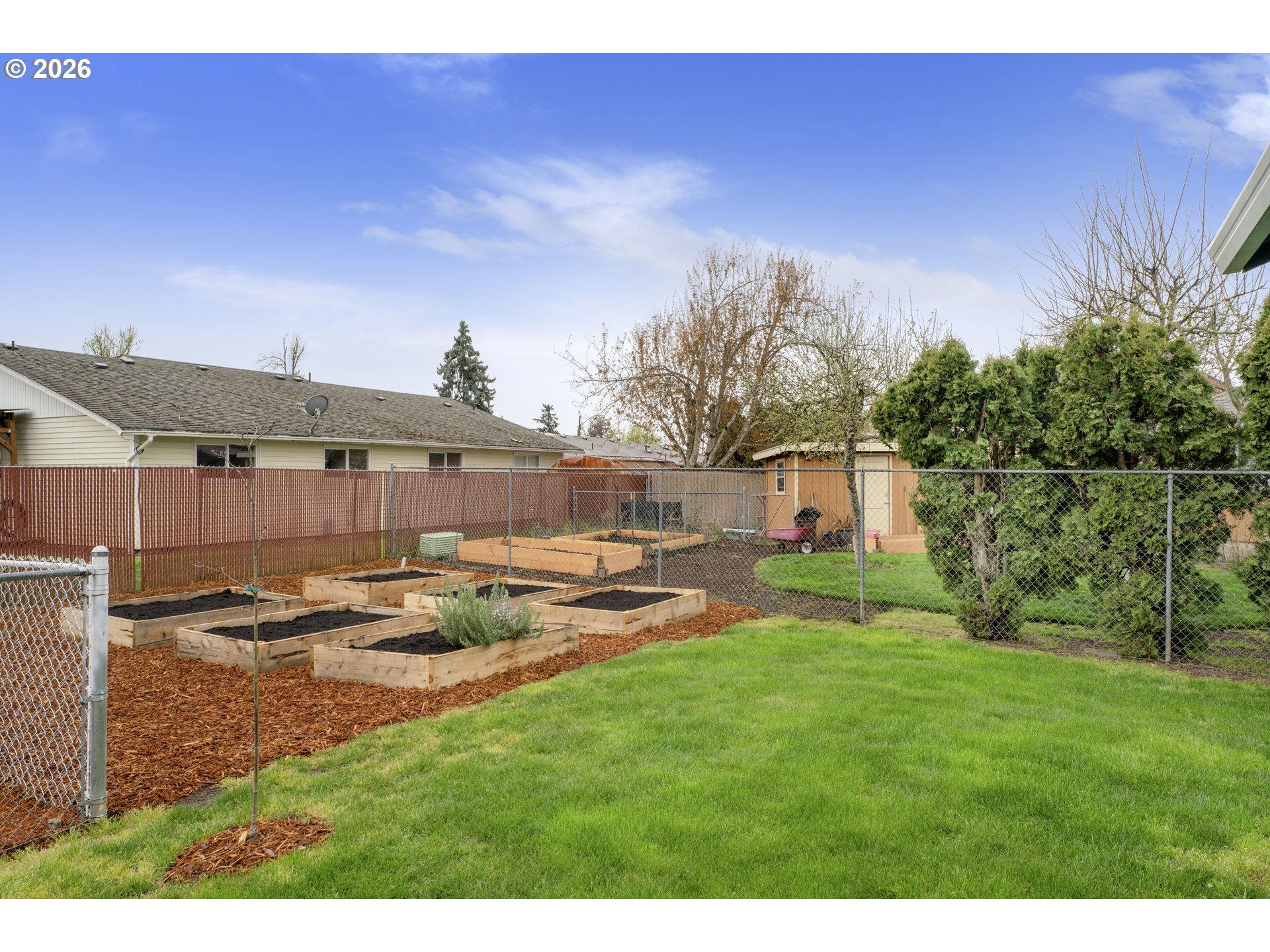 340 54th Street Springfield, OR 97478 - Photo 29 of 33 a backyard of a house with table and chairs