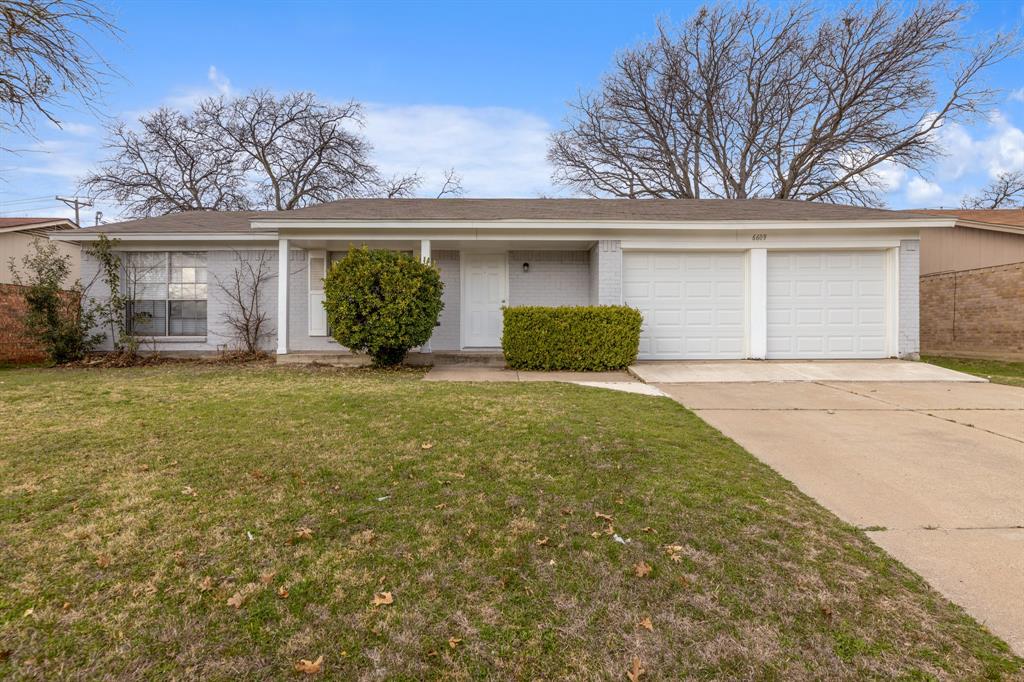 6609 Bernadine Street Watauga, TX 76148 - Photo 1 of 1 front view of a house with a yard