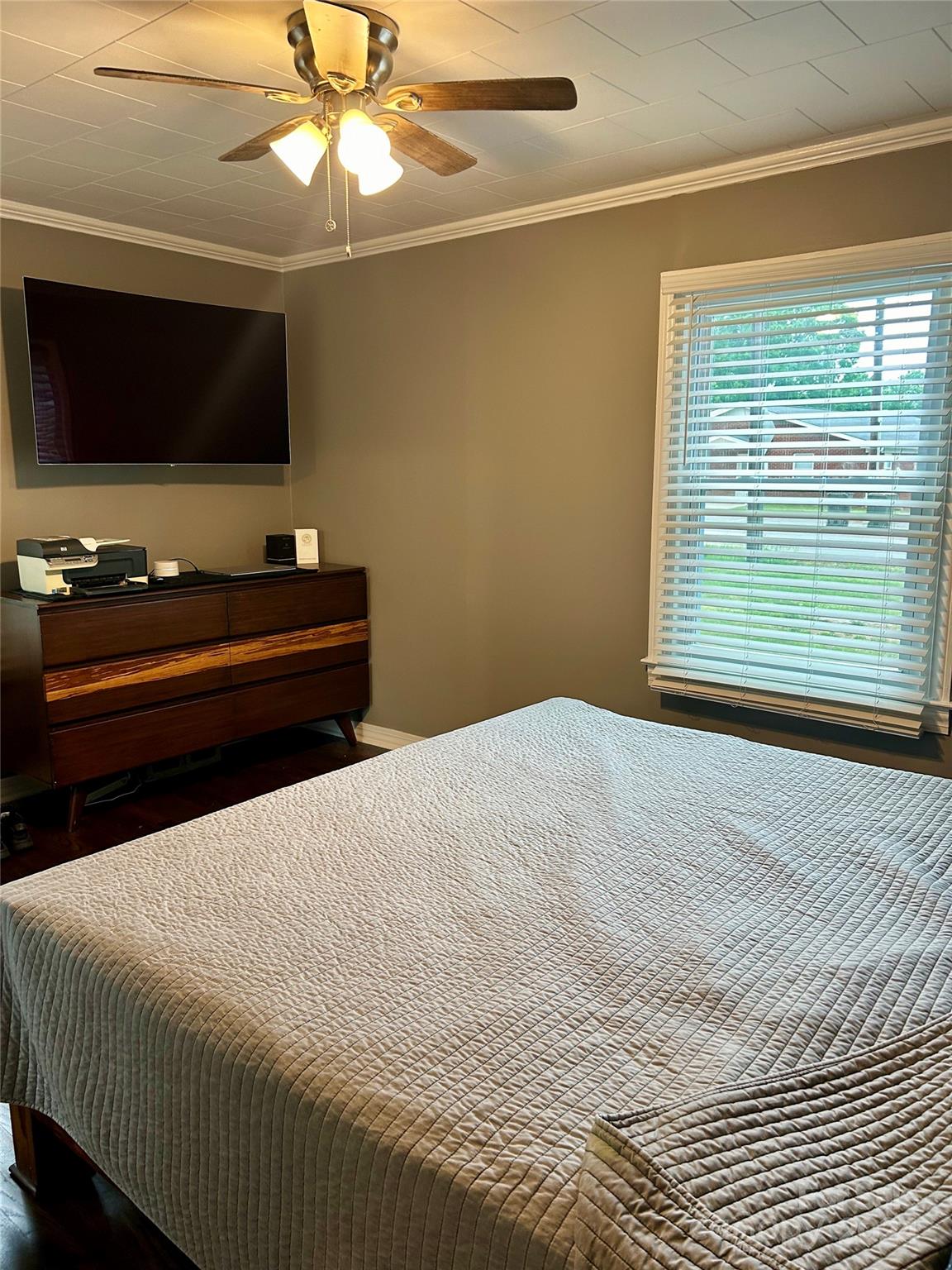 710 Union Cemetery Road Southwest Concord, NC 28027 - Photo 11 of 30 a bedroom with a bed and a flat screen tv