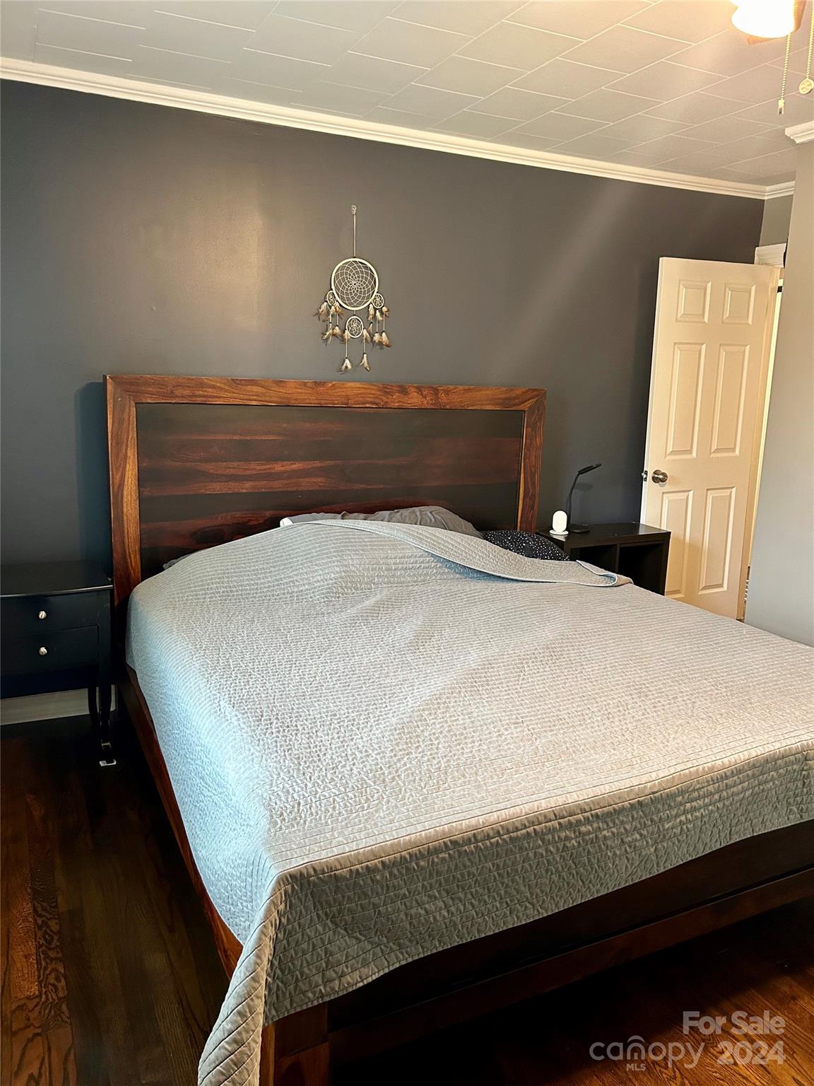 710 Union Cemetery Road Southwest Concord, NC 28027 - Photo 12 of 30 a bed sitting in a bedroom next to a window