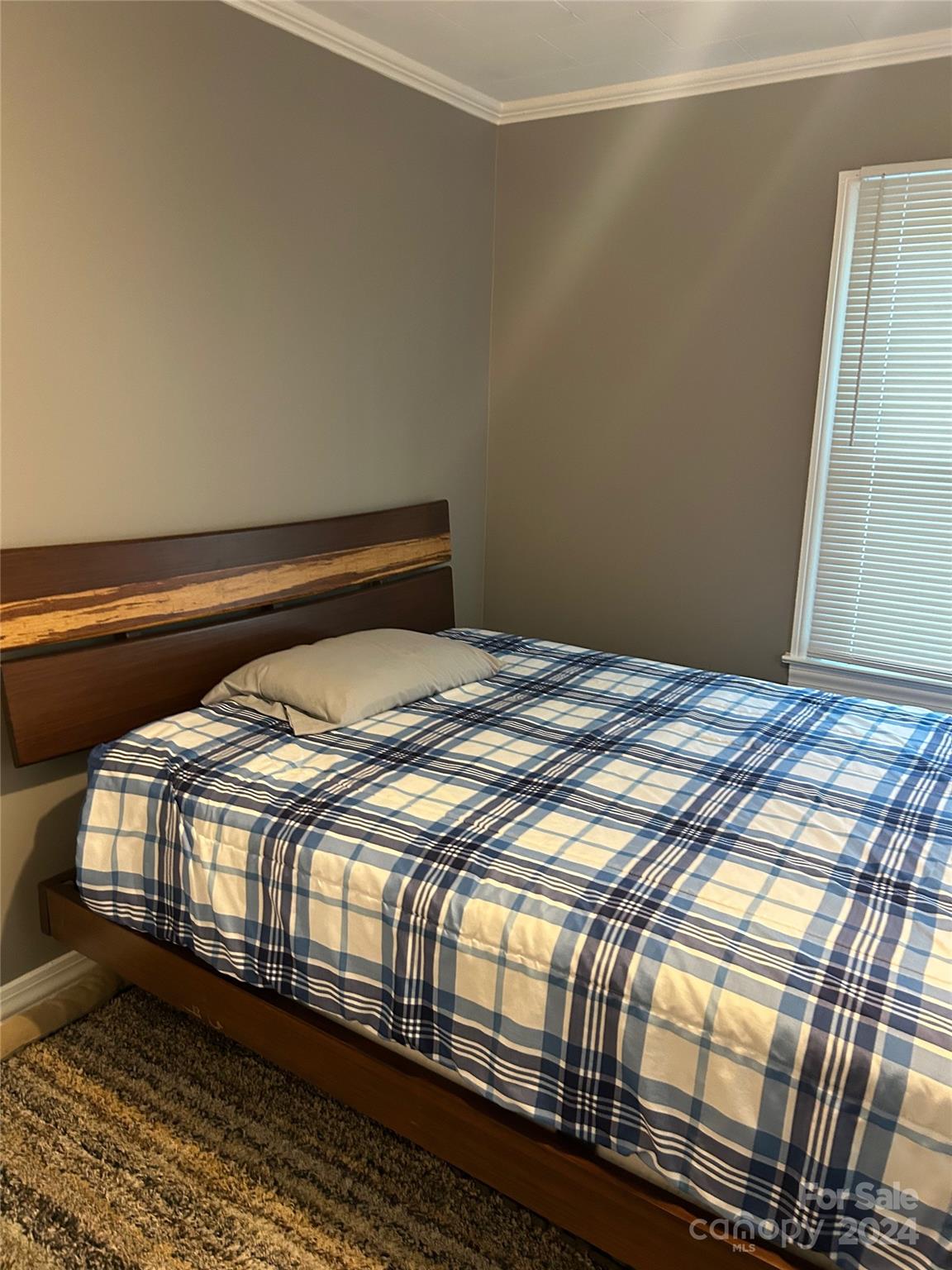 710 Union Cemetery Road Southwest Concord, NC 28027 - Photo 18 of 30 a bedroom with a bed