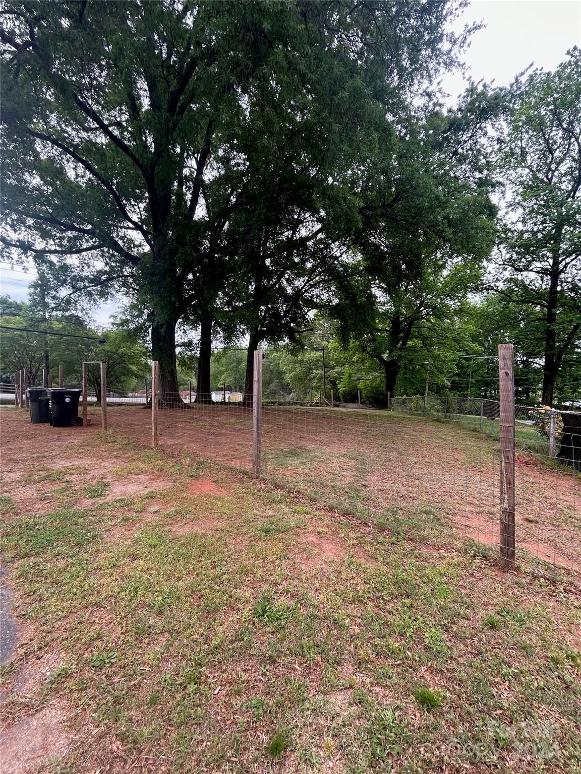 710 Union Cemetery Road Southwest Concord, NC 28027 - Photo 27 of 30 a backyard of a house with lots of green space