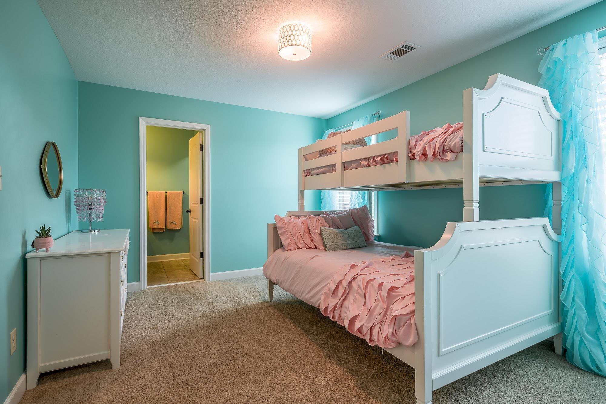 1347 Conser Street Collierville, TN 38017 - Photo 14 of 25 a bedroom with a bed and a table