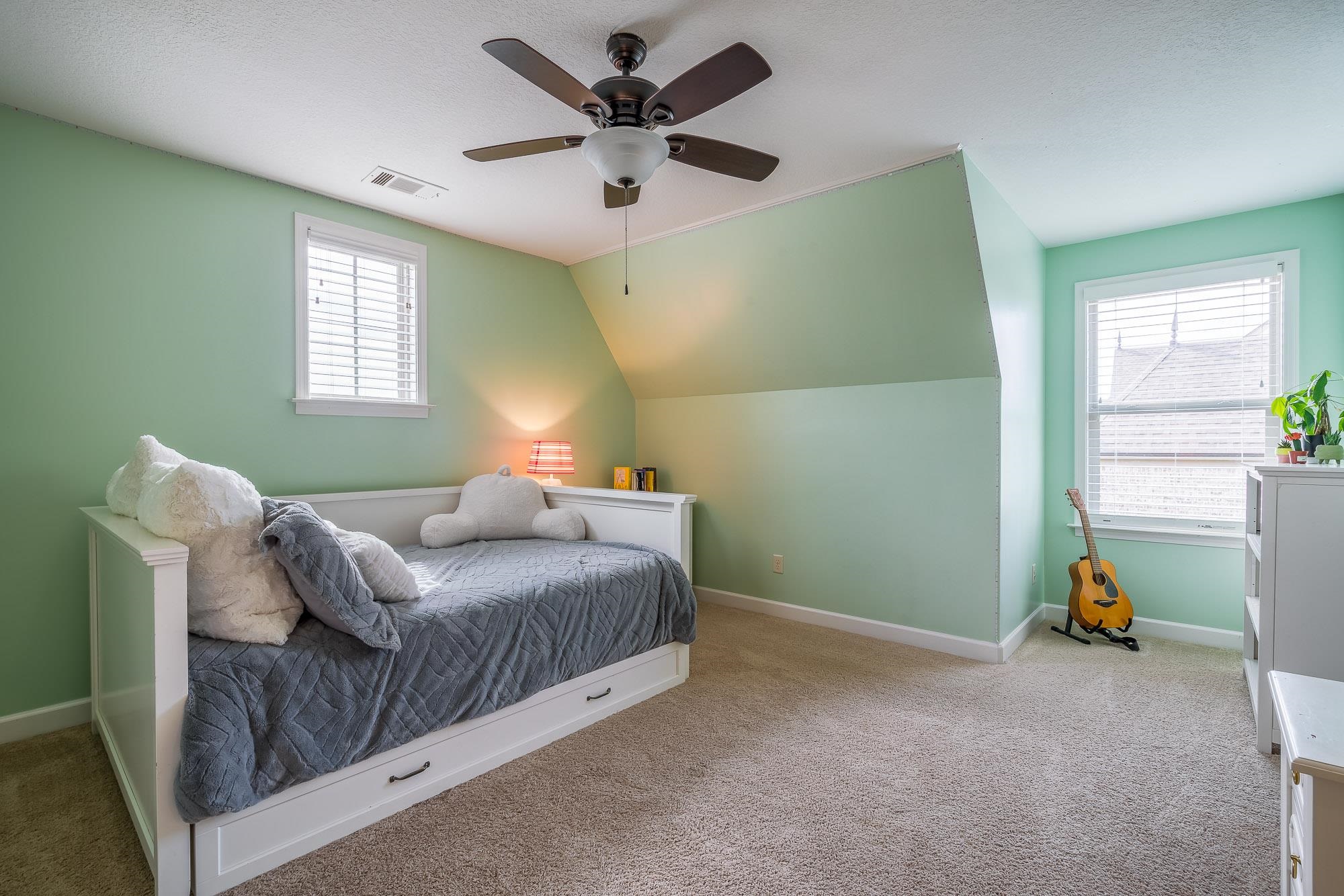 1347 Conser Street Collierville, TN 38017 - Photo 15 of 25 a bedroom with a bed and a window