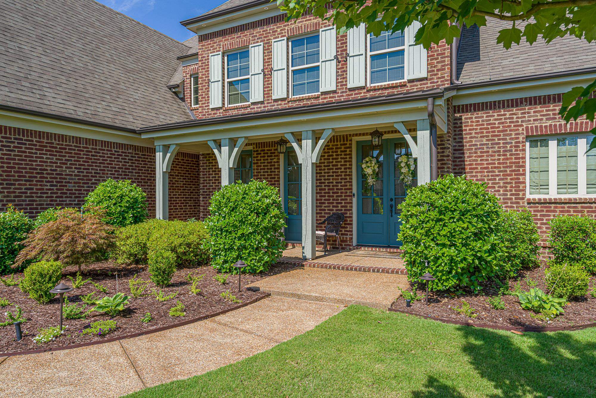 1347 Conser Street Collierville, TN 38017 - Photo 2 of 25 front view of a house with a yard