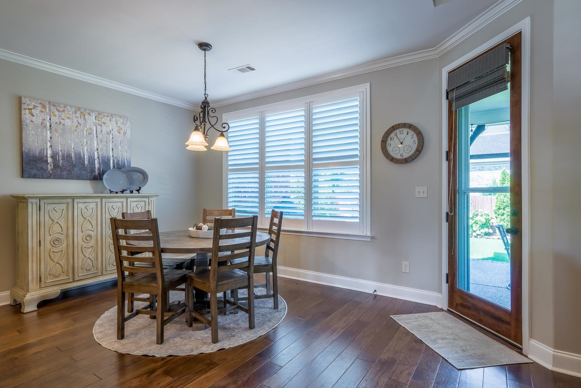 1347 Conser Street Collierville, TN 38017 - Photo 6 of 25 a view of a dining room with furniture window and wooden floor