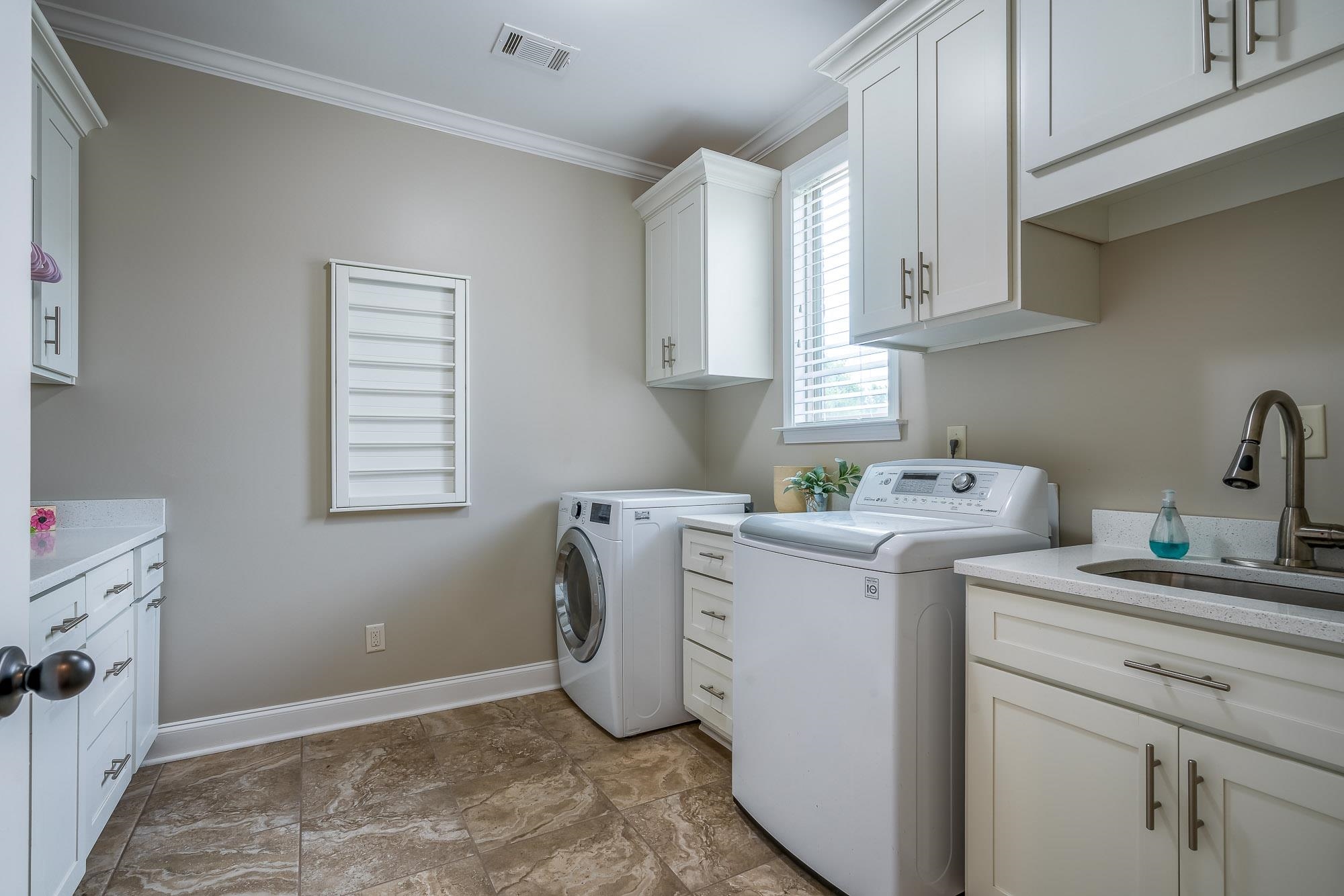 1347 Conser Street Collierville, TN 38017 - Photo 9 of 25 a utility room with dryer and washer