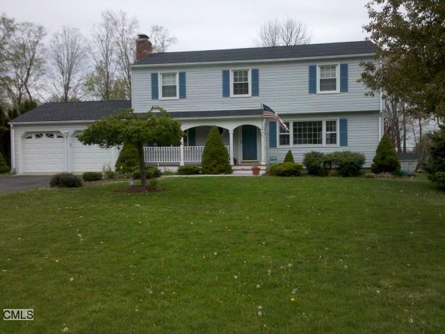 21 Apple Tree Road Bethel, CT 06801 - Photo 1 of 1 a front view of a house with a yard