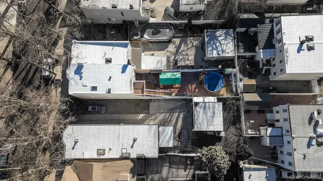 a view of a house with backyard porch and furniture