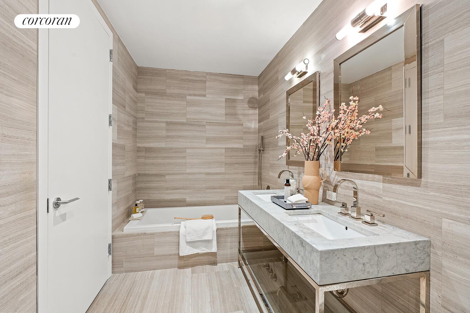 250 West Street, Unit 8H Manhattan, NY 10013 - Photo 10 of 16 a bathroom with a sink a toilet a mirror and shower