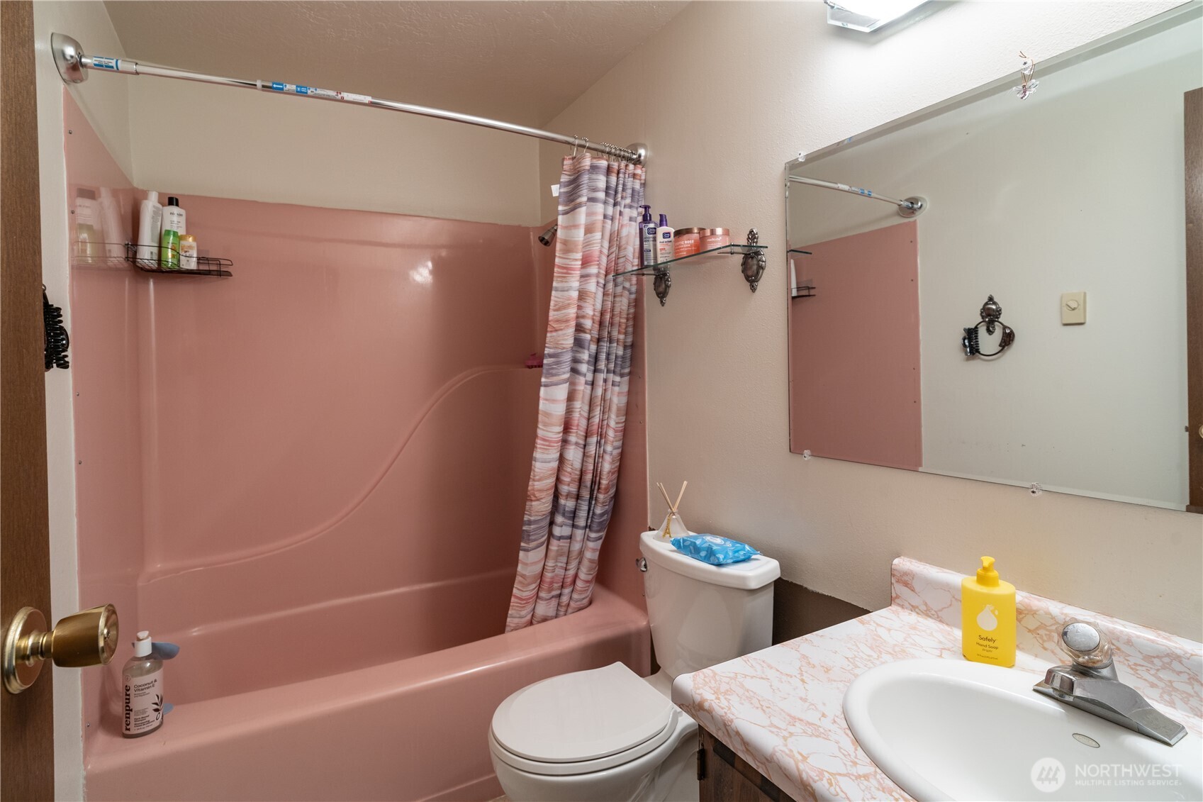 1215 Dundee Drive Cosmopolis, WA 98537 - Photo 18 of 30 a bathroom with a sink toilet and shower