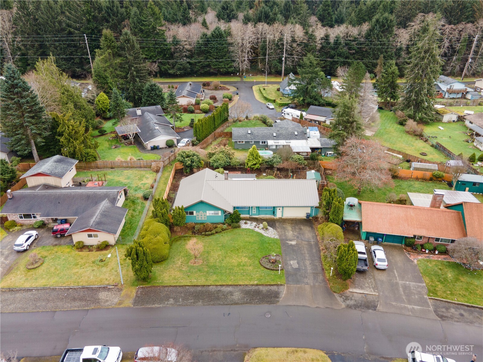 1215 Dundee Drive Cosmopolis, WA 98537 - Photo 2 of 30 an aerial view of a house with a garden and lake view