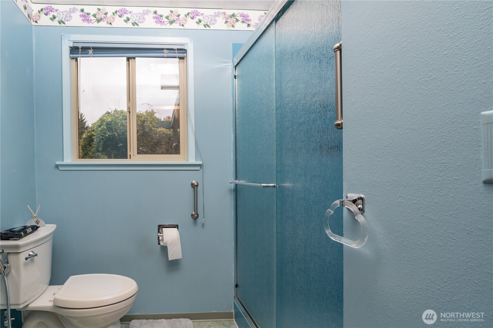 1215 Dundee Drive Cosmopolis, WA 98537 - Photo 23 of 30 a white toilet sitting next to a bathroom sink