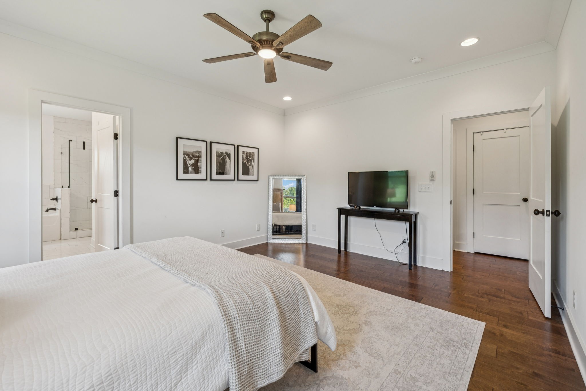 760 Johnson Hollow Road Watertown, TN 37184 - Photo 16 of 53 a bedroom with a bed and a flat screen tv