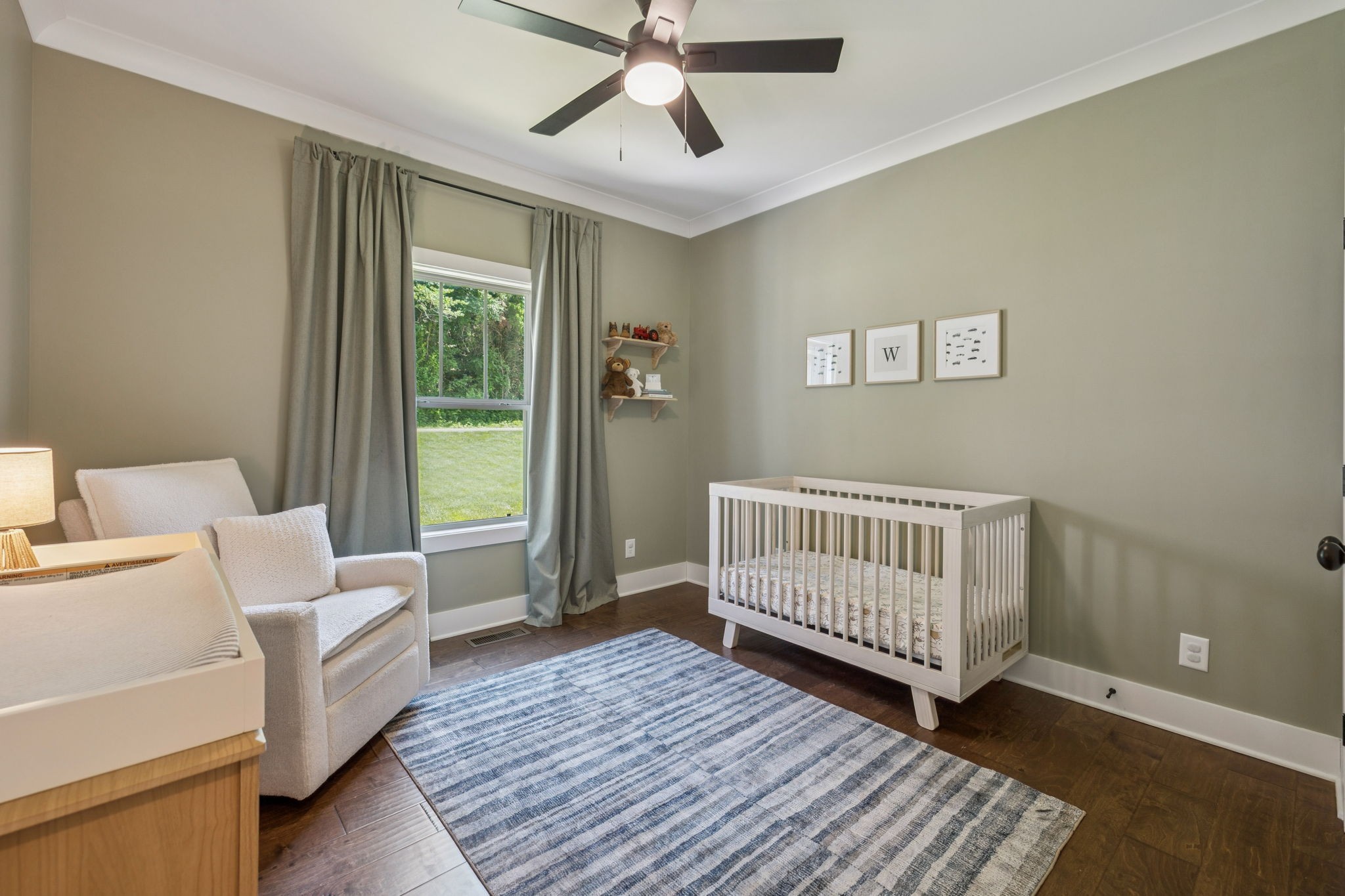 760 Johnson Hollow Road Watertown, TN 37184 - Photo 21 of 53 a bedroom with a bed and wooden floor