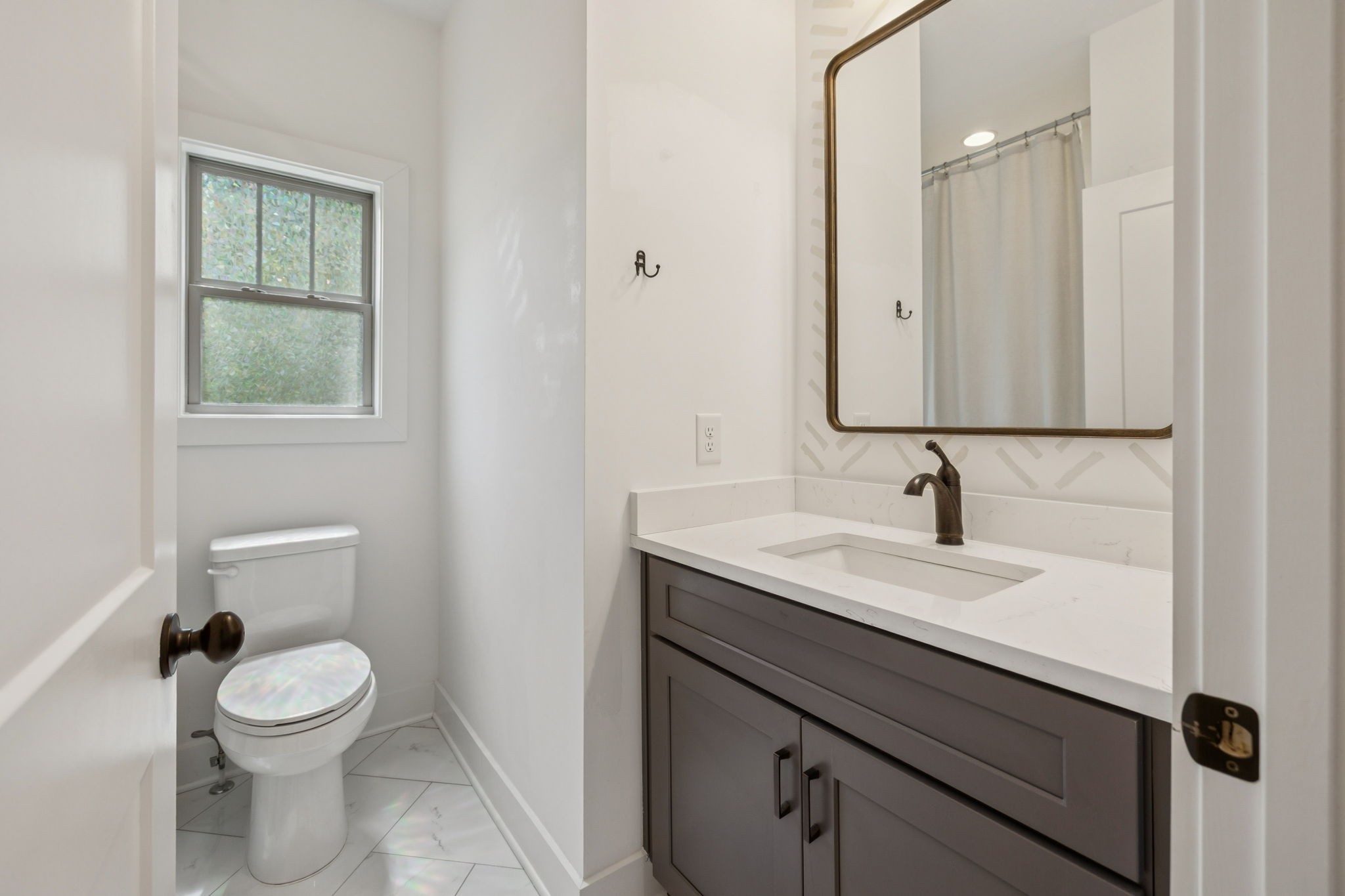760 Johnson Hollow Road Watertown, TN 37184 - Photo 24 of 53 a bathroom with a toilet sink and mirror