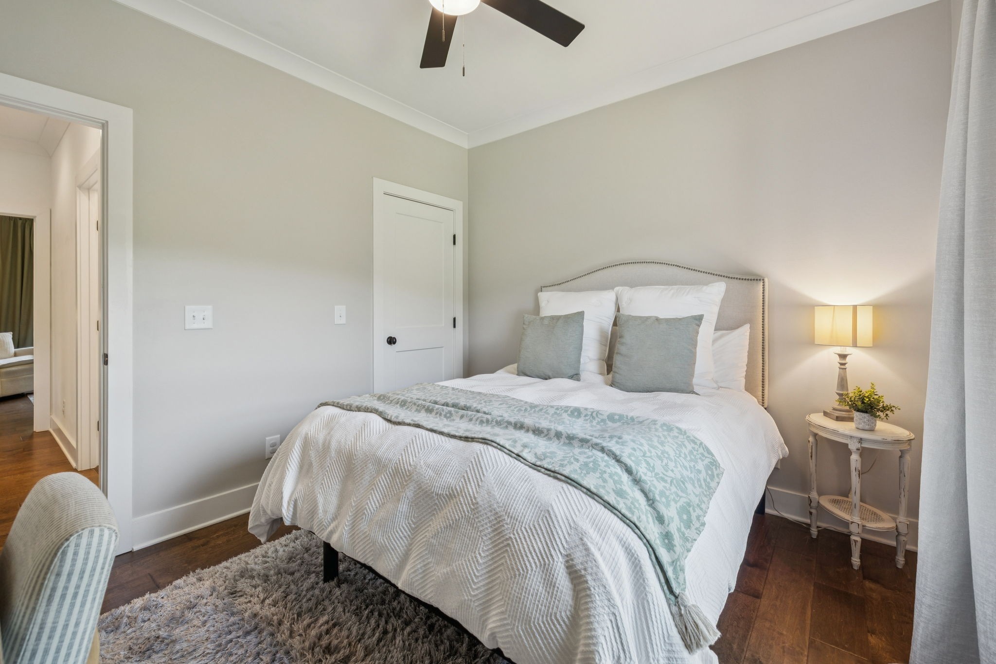 760 Johnson Hollow Road Watertown, TN 37184 - Photo 27 of 53 a bedroom with a bed and wooden floor