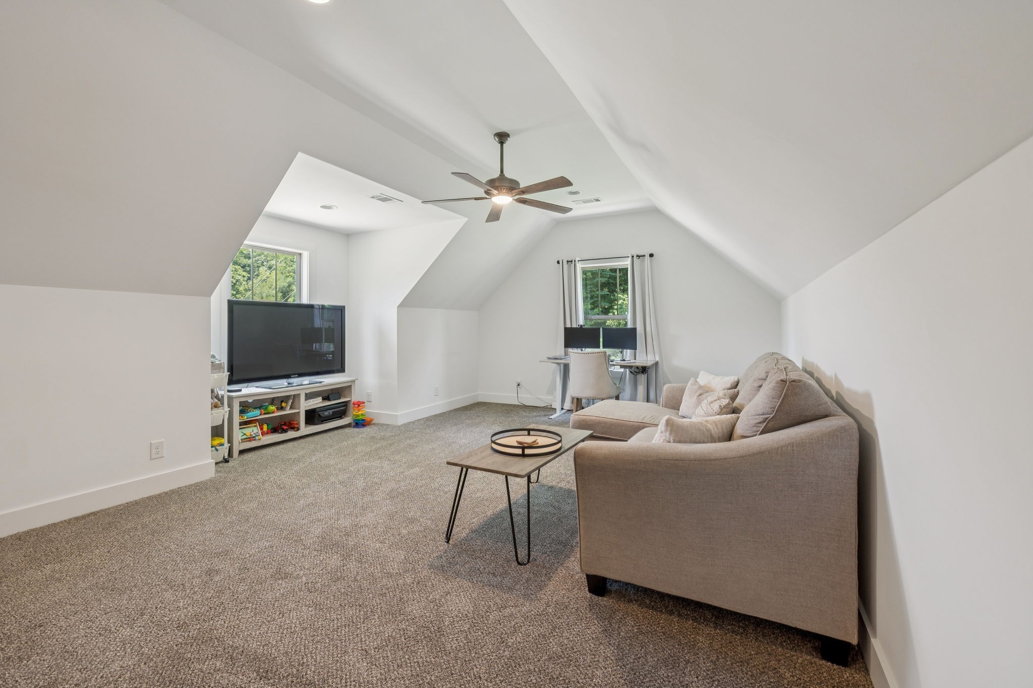 760 Johnson Hollow Road Watertown, TN 37184 - Photo 32 of 53 a living room with furniture and a flat screen tv