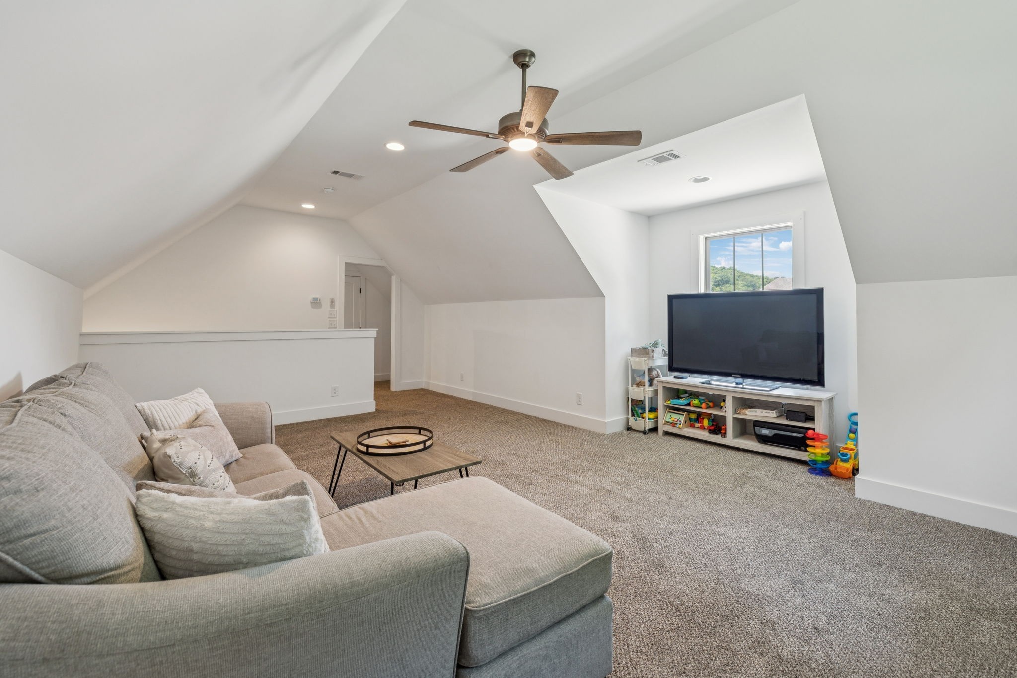 760 Johnson Hollow Road Watertown, TN 37184 - Photo 34 of 53 a living room with furniture and a flat screen tv