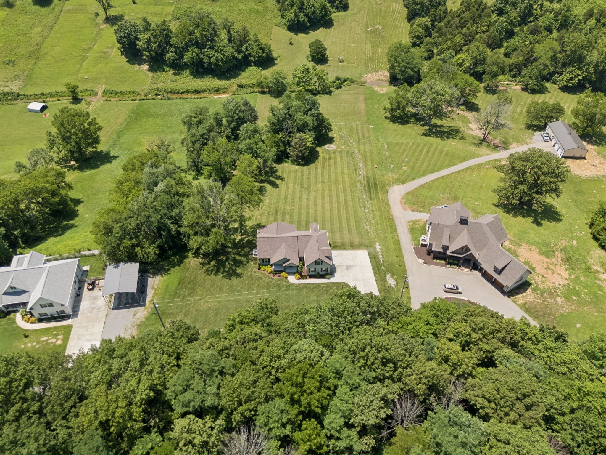 760 Johnson Hollow Road Watertown, TN 37184 - Photo 43 of 53 an aerial view of a house with a yard