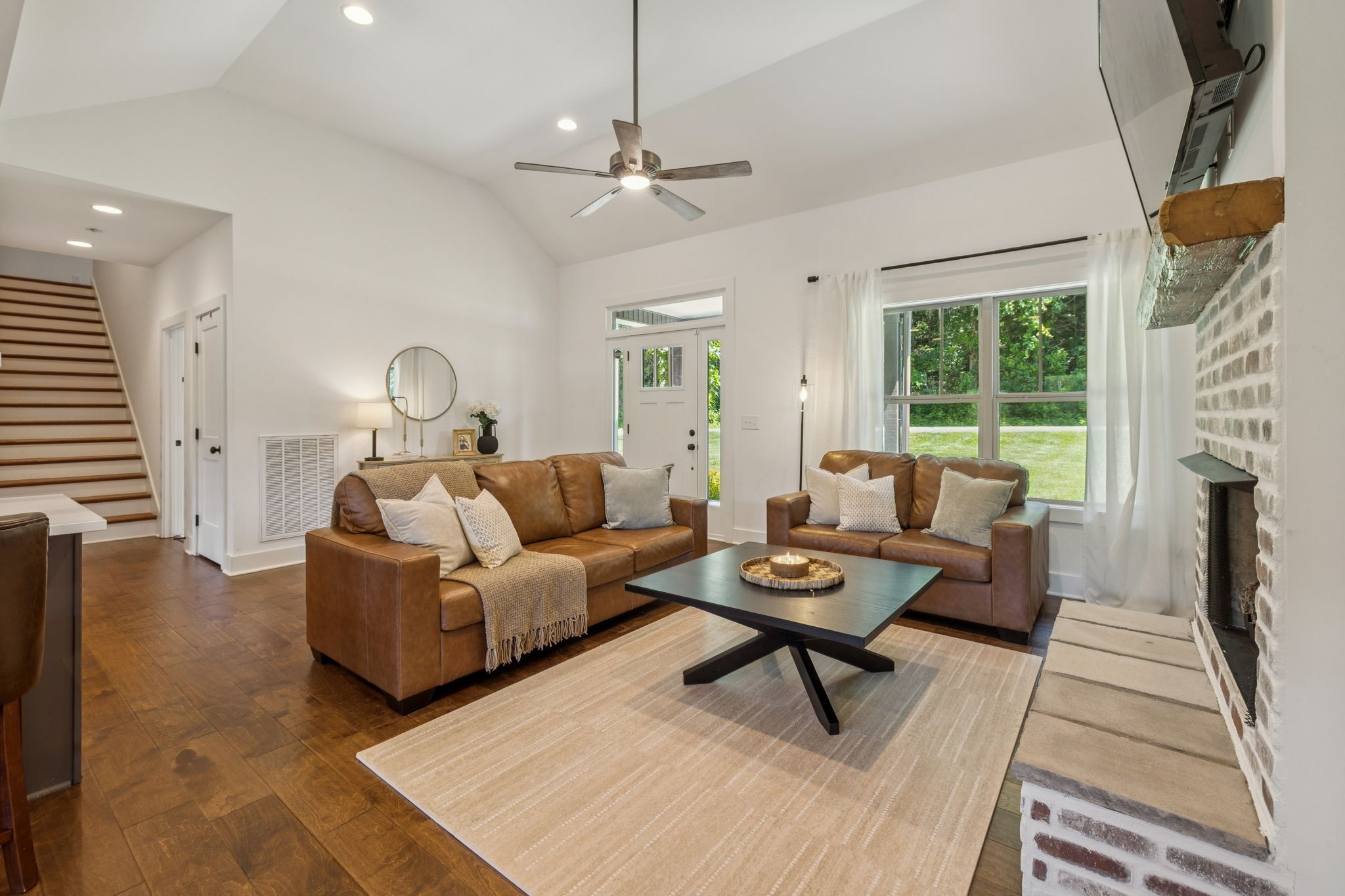 760 Johnson Hollow Road Watertown, TN 37184 - Photo 6 of 53 a living room with furniture and a fireplace