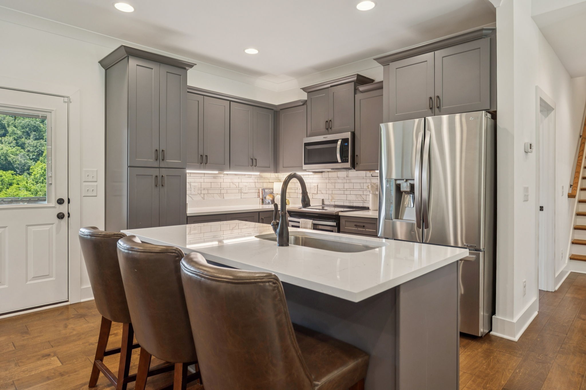 760 Johnson Hollow Road Watertown, TN 37184 - Photo 8 of 53 a kitchen with kitchen island a sink stove and refrigerator