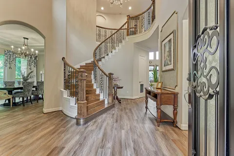 a view of entryway with wooden floor