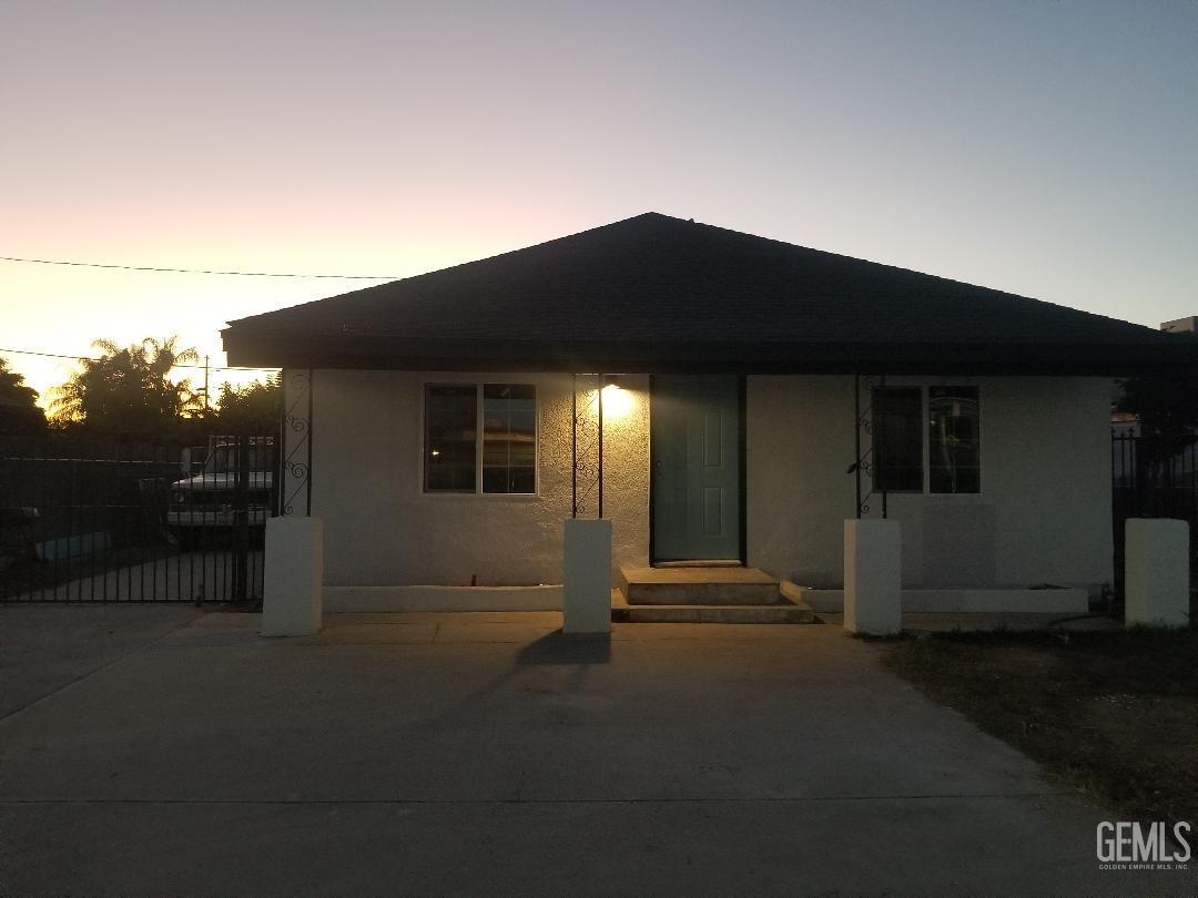 Undisclosed Address Delano, CA 93215 - Photo 1 of 10 a front view of a house