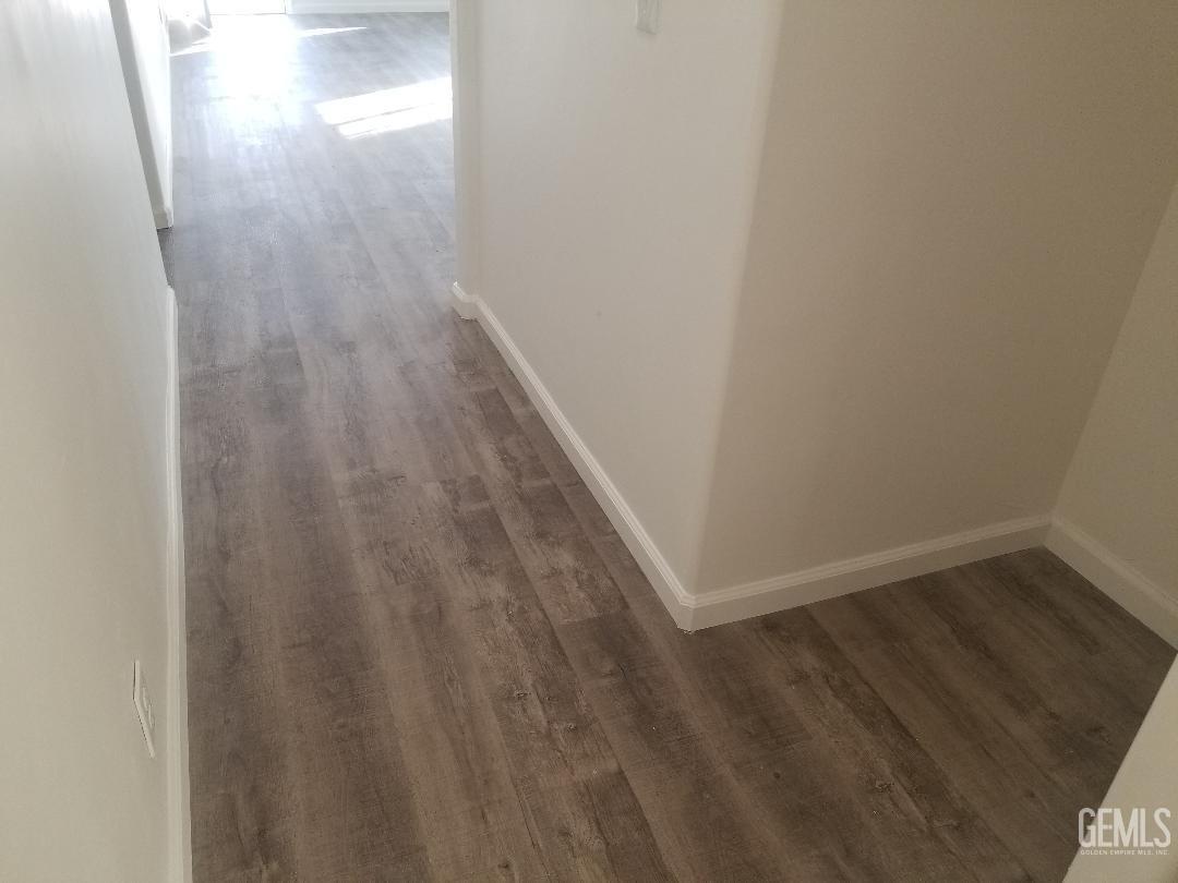 Undisclosed Address Delano, CA 93215 - Photo 7 of 10 a view of wooden floor